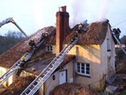 Burning thatched roof